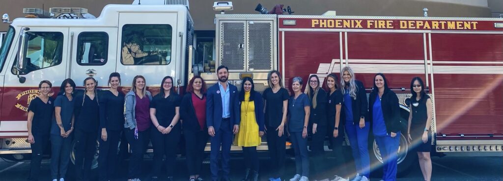 City of Phoenix in front of a fire engine